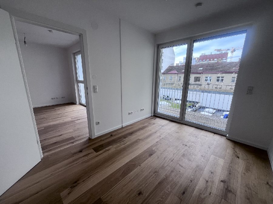 Muhr58 | Sonnige 3-Zimmerwohnung mit Balkon | Hofruhelage | Erstbezug